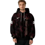 customized-texas-state-bobcats-pixel-grid-maroon-black-hoodie-best-selling.webp